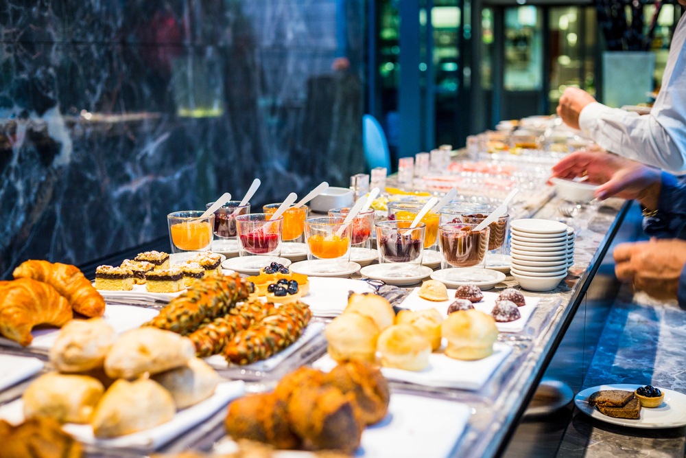 Guest laziness and poor dining room layout contributes to high plate waste at buffets