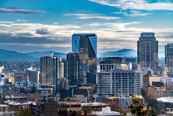 The developer of Block 216, a downtown Portland tower anchored by the Ritz-Carlton, faces Hotel California foreclosure